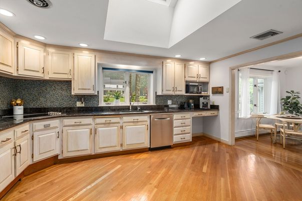 Dining room, Interior, Kitchen, Recessed Lighting, Stainless Steel Appliances, Wood Texture Flooring