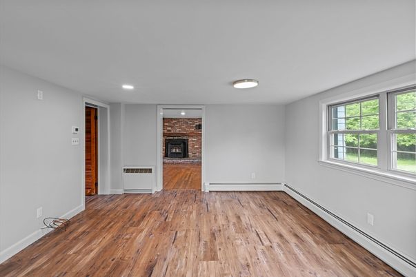 Empty room, Fireplace, Interior, Recessed Lighting, Wood Texture Flooring