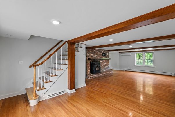 Empty room, Fireplace, Interior, Recessed Lighting, Wooden Beams, Wood Texture Flooring