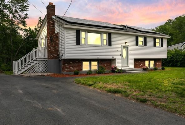 Exterior, Facade, Brick Facade, Solar Panels, Raised Ranch