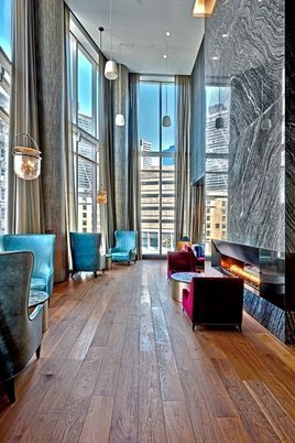 Fireplace, Interior, Living room, Marble Walls, Pendant Lights, Recessed Lighting, Wood Texture Flooring