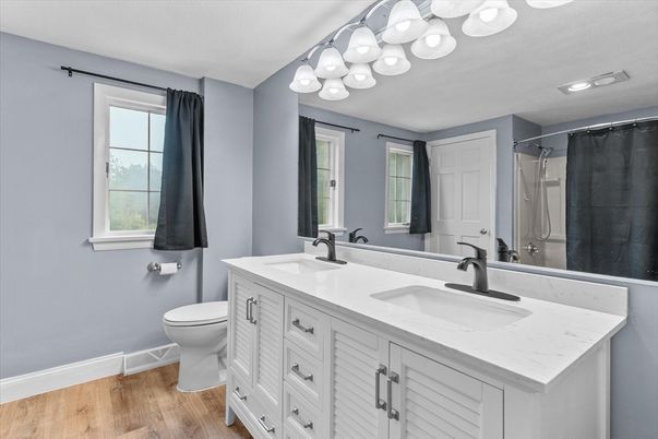 Bathroom, Dual Sink Vanities, Interior, Recessed Lighting, Wood Texture Flooring