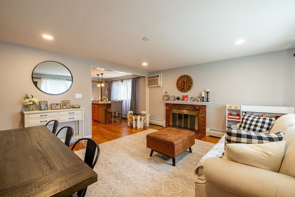 Dining room, Fireplace, Interior, Living room, Pendant Lights, Recessed Lighting, Wood Texture Flooring