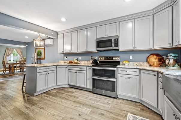 Dining room, Interior, Kitchen, Recessed Lighting, Stainless Steel Appliances, Wood Texture Flooring