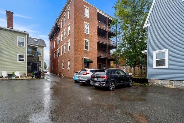 Exterior, Facade, Brick Facade, Condo Building