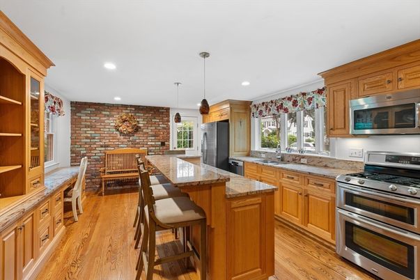 Dining room, Interior, Kitchen, Pendant Lights, Recessed Lighting, Stainless Steel Appliances, Stone Walls, Wood Texture Flooring