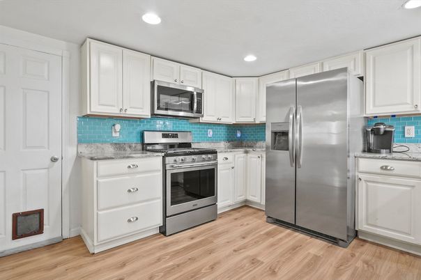 Interior, Kitchen, Recessed Lighting, Stainless Steel Appliances, Wood Texture Flooring