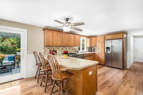 Interior, Kitchen, Stainless Steel Appliances, Tile Countertops, Wood Texture Flooring