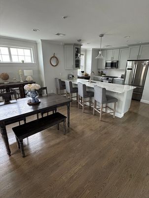 Dining room, Interior, Kitchen, Pendant Lights, Recessed Lighting, Stainless Steel Appliances, Wood Texture Flooring