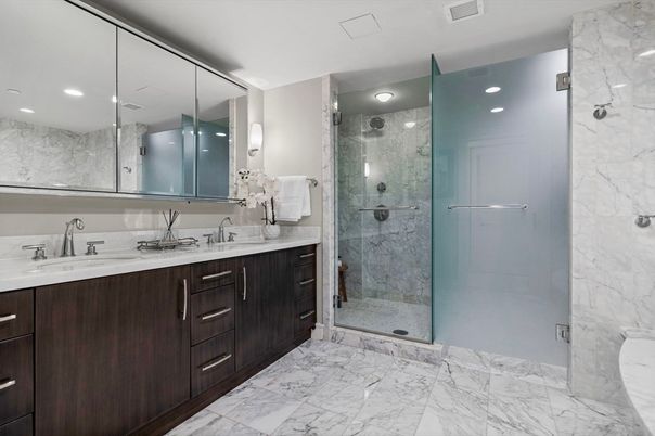 Bathroom, Dual Sink Vanities, Glass Shower, Interior, Marble, Marble Walls, Recessed Lighting
