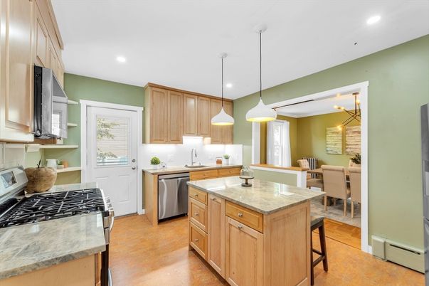 Dining room, Interior, Kitchen, Pendant Lights, Recessed Lighting, Stainless Steel Appliances, Wood Texture Flooring