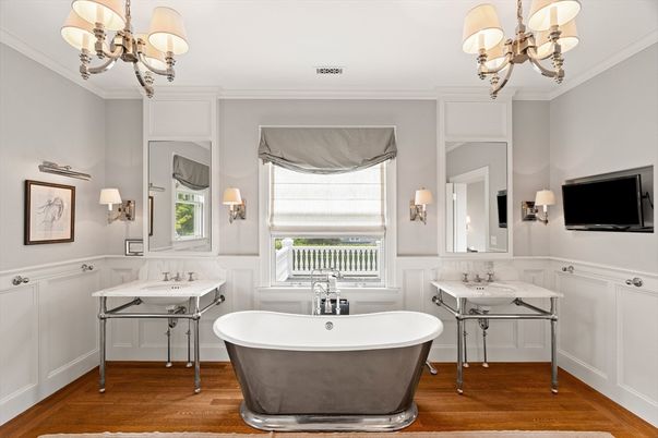 Bathroom, Chandelier, Dual Sink Vanities, Free Standing Baths, Interior, Wood Texture Flooring