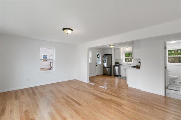 Empty room, Interior, Kitchen, Stainless Steel Appliances, Wood Texture Flooring