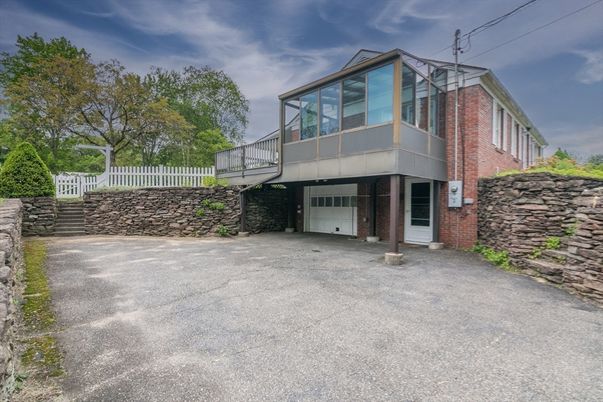 Attached, Exterior, Facade, Brick Facade, Modern