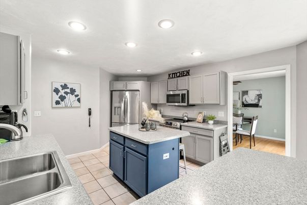 Dining room, Interior, Kitchen, Recessed Lighting, Stainless Steel Appliances, Wood Texture Flooring