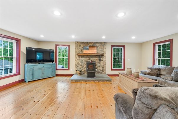 Fireplace, Interior, Living room, Recessed Lighting, Stone Walls, Wood Texture Flooring