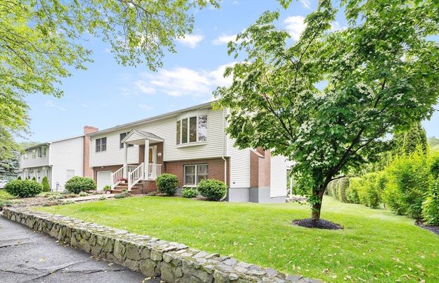 Backyard, Exterior, Facade, Brick Facade, Raised Ranch