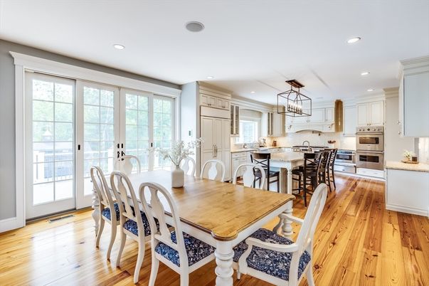 Chandelier, Dining room, Interior, Kitchen, Recessed Lighting, Stainless Steel Appliances, Wood Texture Flooring