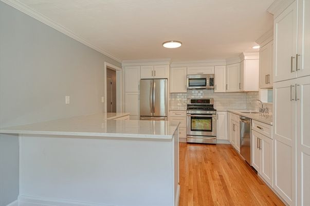 Interior, Kitchen, Recessed Lighting, Stainless Steel Appliances, Wood Texture Flooring
