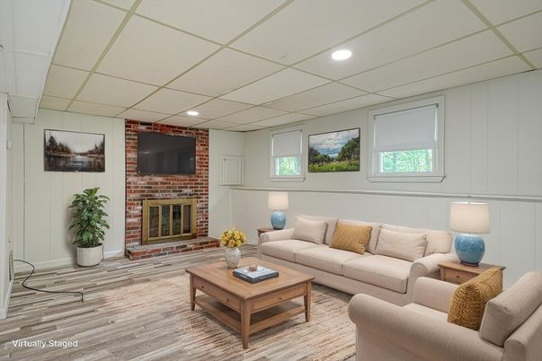 Fireplace, Interior, Living room, Recessed Lighting, Stone Walls, Wood Texture Flooring