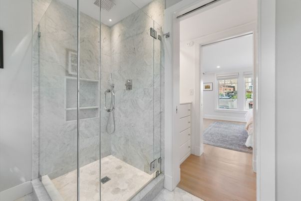 Bathroom, Glass Shower, Interior, Marble Walls, Recessed Lighting, Wood Texture Flooring