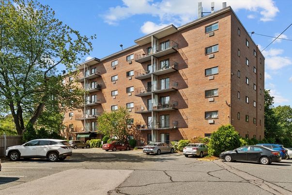 Exterior, Facade, Brick Facade, Condo Building