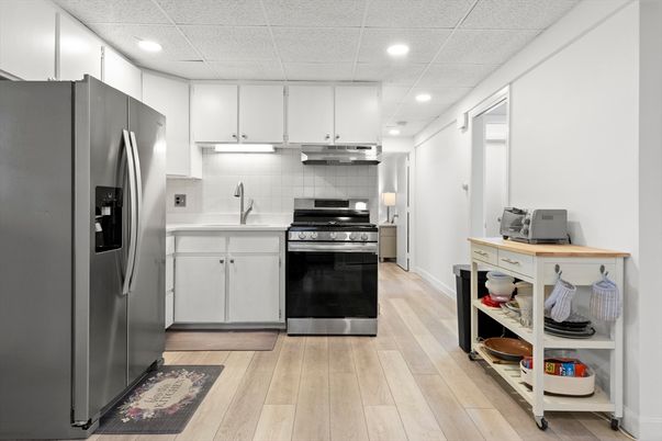 Interior, Kitchen, Recessed Lighting, Stainless Steel Appliances, Wood Texture Flooring