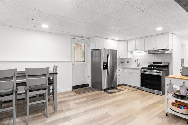 Interior, Kitchen, Recessed Lighting, Stainless Steel Appliances, Wood Texture Flooring