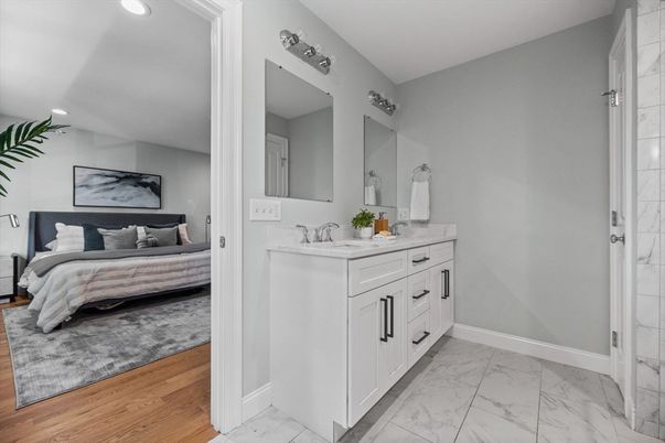 Bathroom, Bedroom, Dual Sink Vanities, Interior, Marble, Recessed Lighting, Wood Texture Flooring