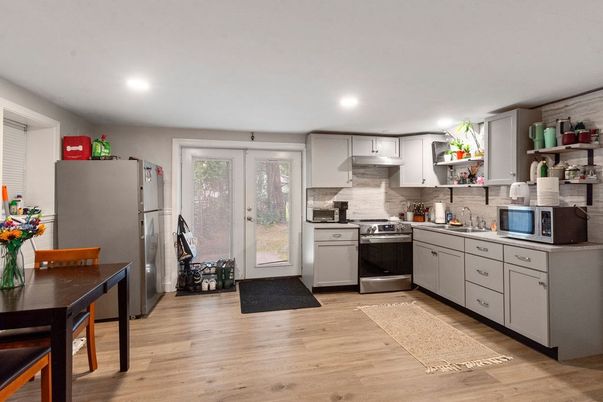Interior, Kitchen, Recessed Lighting, Stainless Steel Appliances, Wood Texture Flooring