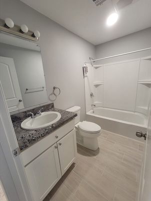 Bathroom, Dual Sink Vanities, Interior, Recessed Lighting, Wood Texture Flooring