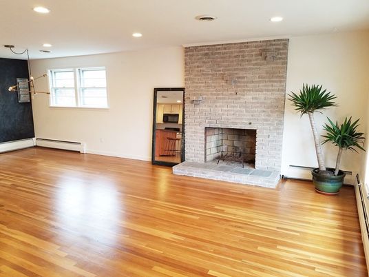Empty room, Fireplace, Interior, Kitchen, Recessed Lighting, Stone Walls, Wood Texture Flooring