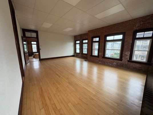 Empty room, Interior, Recessed Lighting, Stone Walls, Wood Texture Flooring