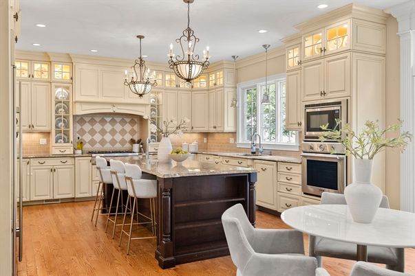 Chandelier, Interior, Kitchen, Pendant Lights, Recessed Lighting, Stainless Steel Appliances, Wood Texture Flooring
