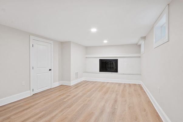 Empty room, Fireplace, Interior, Recessed Lighting, Wood Texture Flooring
