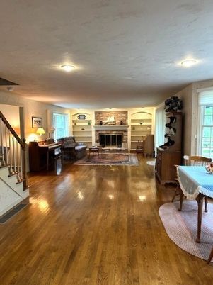 Dining room, Fireplace, Interior, Living room, Recessed Lighting, Wood Texture Flooring
