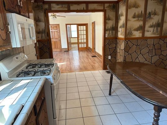 Interior, Kitchen, Tile Countertops, Wood Texture Flooring