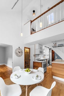Dining room, Interior, Kitchen, Pendant Lights, Stainless Steel Appliances, Wood Texture Flooring