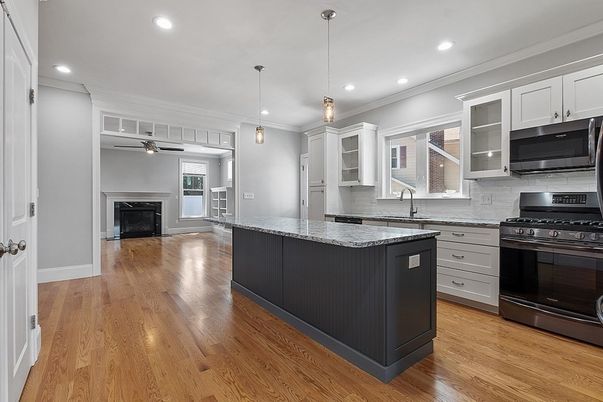 Fireplace, Interior, Kitchen, Pendant Lights, Recessed Lighting, Stainless Steel Appliances, Wood Texture Flooring