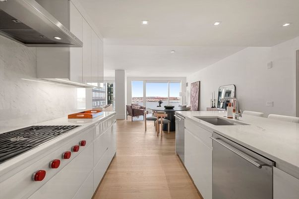 Dining room, Interior, Kitchen, Living room, Marble Walls, Pendant Lights, Recessed Lighting, Stainless Steel Appliances, Wood Texture Flooring