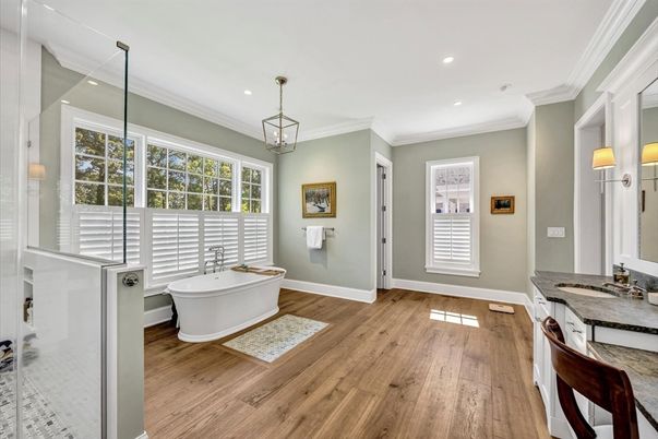 Bathroom, Free Standing Baths, Glass Shower, Interior, Pendant Lights, Recessed Lighting, Wood Texture Flooring