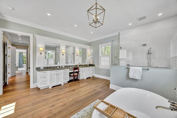 Bathroom, Dual Sink Vanities, Free Standing Baths, Glass Shower, Interior, Pendant Lights, Recessed Lighting, Wood Texture Flooring