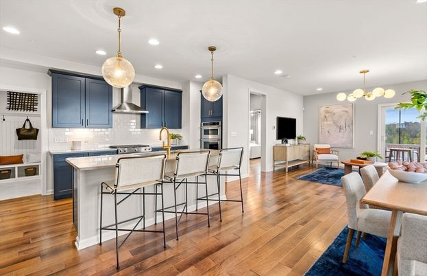 Dining room, Interior, Kitchen, Pendant Lights, Recessed Lighting, Stainless Steel Appliances, Wood Texture Flooring