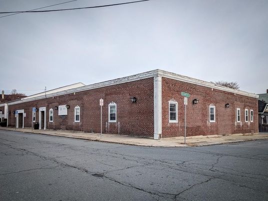 Exterior, Facade, Brick Facade, Condo Building