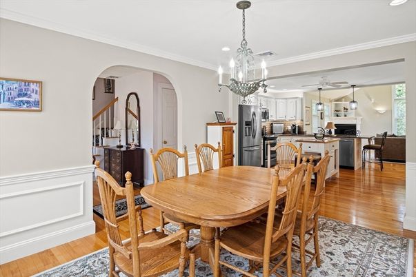 Chandelier, Dining room, Interior, Kitchen, Pendant Lights, Recessed Lighting, Stainless Steel Appliances, Wood Texture Flooring