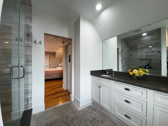 Bathroom, Bedroom, Dual Sink Vanities, Glass Shower, Interior, Recessed Lighting, Wood Texture Flooring