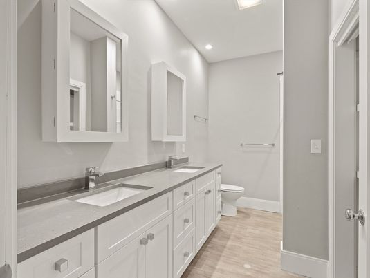 Bathroom, Dual Sink Vanities, Interior, Recessed Lighting, Wood Texture Flooring