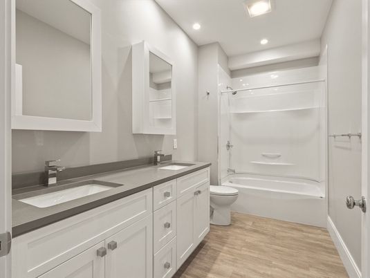 Bathroom, Dual Sink Vanities, Interior, Recessed Lighting, Wood Texture Flooring