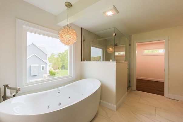 Bathroom, Free Standing Baths, Glass Shower, Interior, Marble, Pendant Lights, Recessed Lighting, Wood Texture Flooring