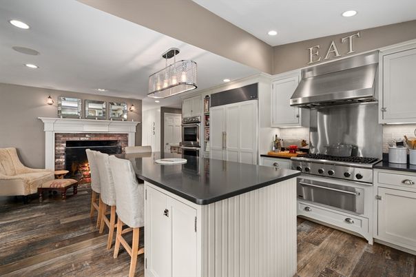 Fireplace, Interior, Kitchen, Pendant Lights, Recessed Lighting, Stainless Steel Appliances, Wood Texture Flooring